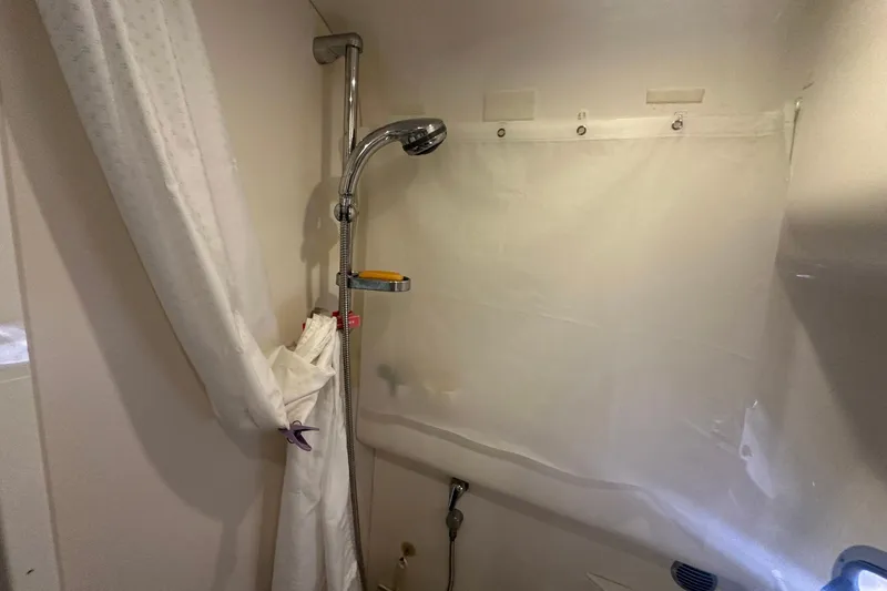 Slide: The Image of Shower area in 2005 Formula 37 PC boat with curtain and handheld showerhead. - 26