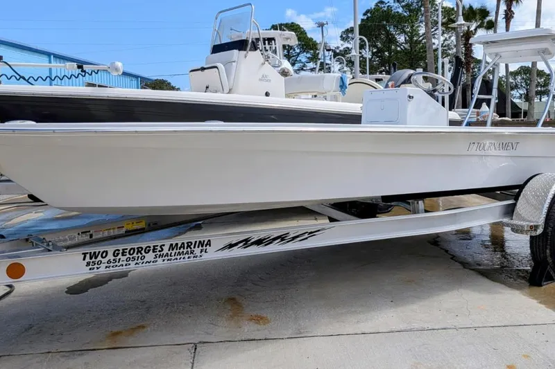 Slide: The Image of Open storage compartment on 2026 Mitzi Skiffs 17 Tournament boat. - 7