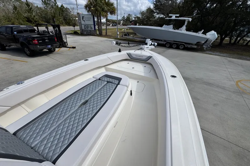 Slide: The Image of 2026 ShearWater 270 SS Open Carolina boat with sleek design and spacious deck. - 15