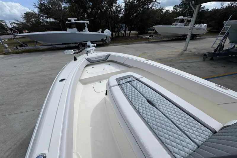 Slide: The Image of 2026 ShearWater 270 SS Open Carolina boat with sleek design and spacious seating. - 17