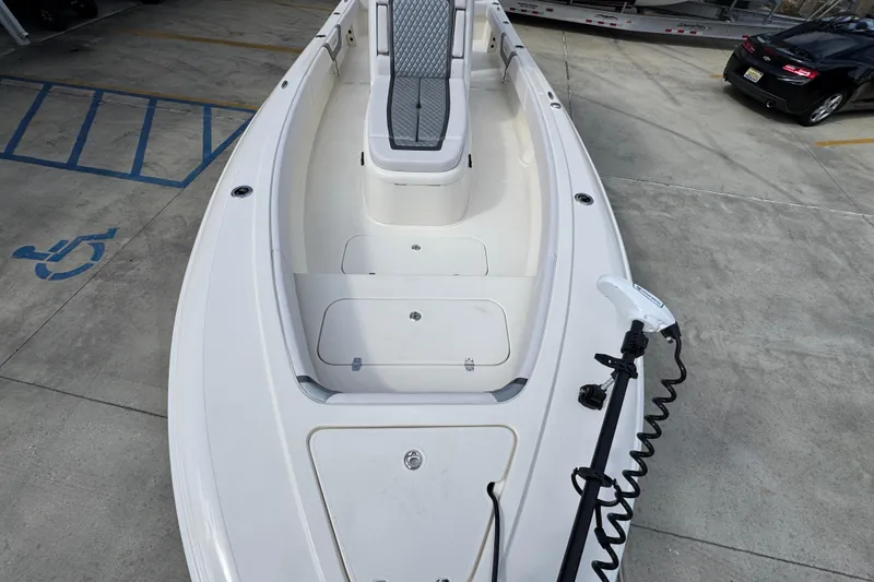 Slide: The Image of 2026 ShearWater 270 SS Open Carolina boat, top view, docked on concrete surface. - 19