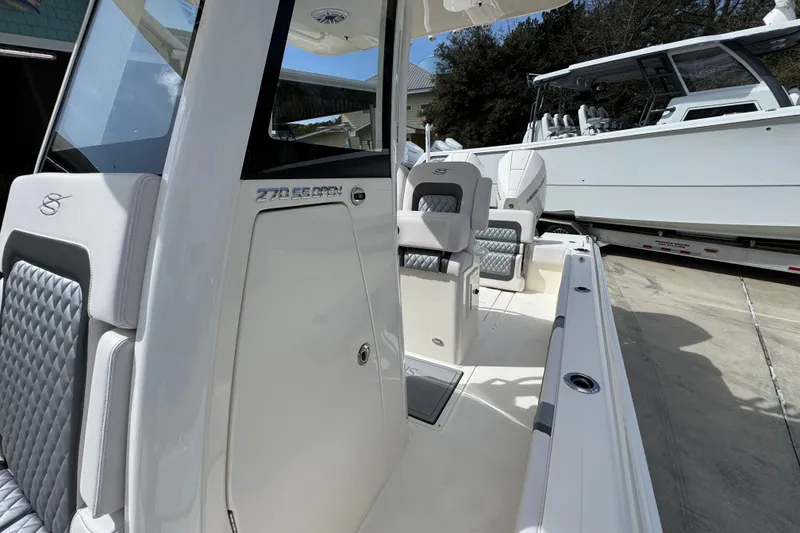 Slide: The Image of 2026 ShearWater 270 SS Open Carolina boat interior with sleek seating and modern design. - 22