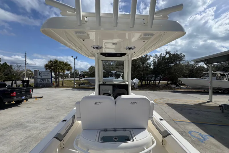 Slide: The Image of 2026 ShearWater 270 SS Open Carolina boat interior with seating and canopy. - 37