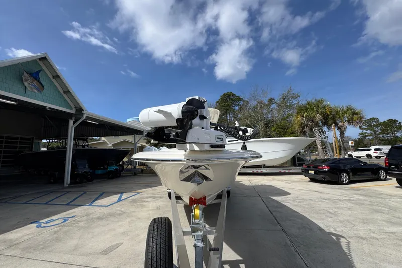 Slide: The Image of 2026 ShearWater 270 SS Open Carolina boat on trailer under blue sky. - 5