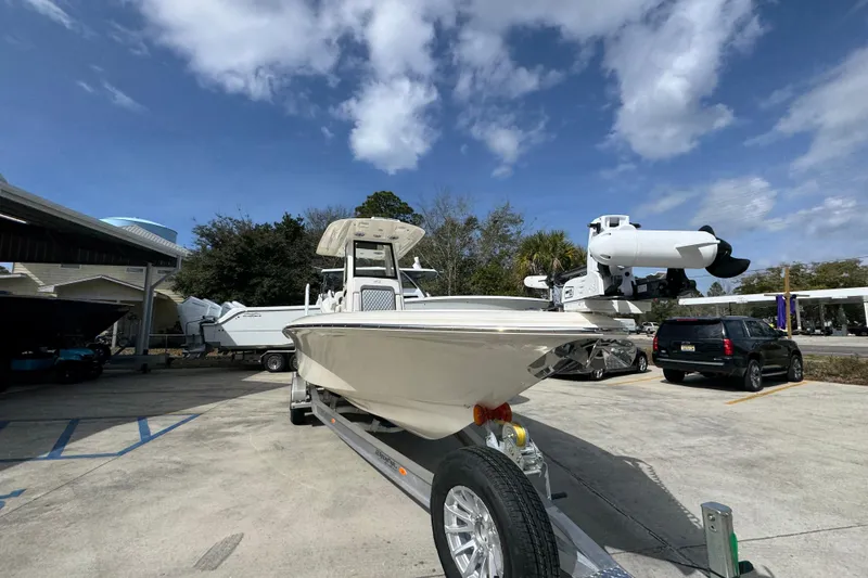 Slide: The Image of 2026 ShearWater 270 SS Open Carolina boat on trailer under blue sky. - 6