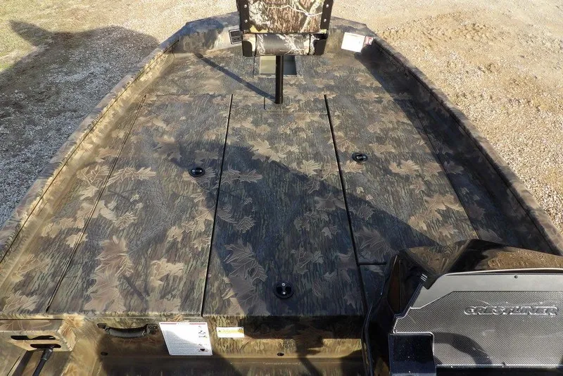 Slide: The Image of 2026 Crestliner XF 189 boat with camouflage deck pattern, ideal for fishing and outdoor adventures. - 21