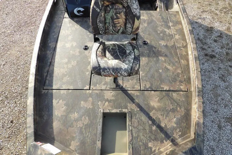 Slide: The Image of 2026 Crestliner XF 189 boat with camouflage design and seating, viewed from above. - 25