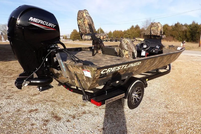 Slide: The Image of 2026 Crestliner XF 189 boat with camouflage design and Mercury outboard motor. - 3