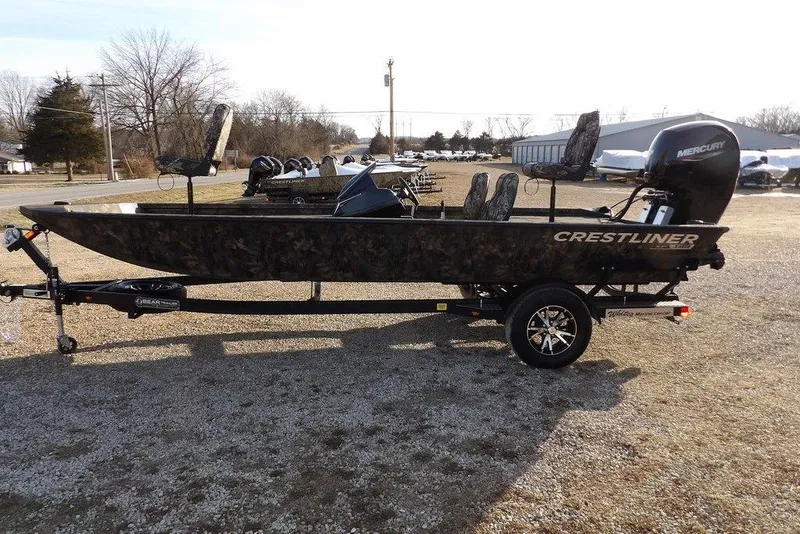 Slide: The Image of 2026 Crestliner XF 189 fishing boat with Mercury engine on a trailer. - 5
