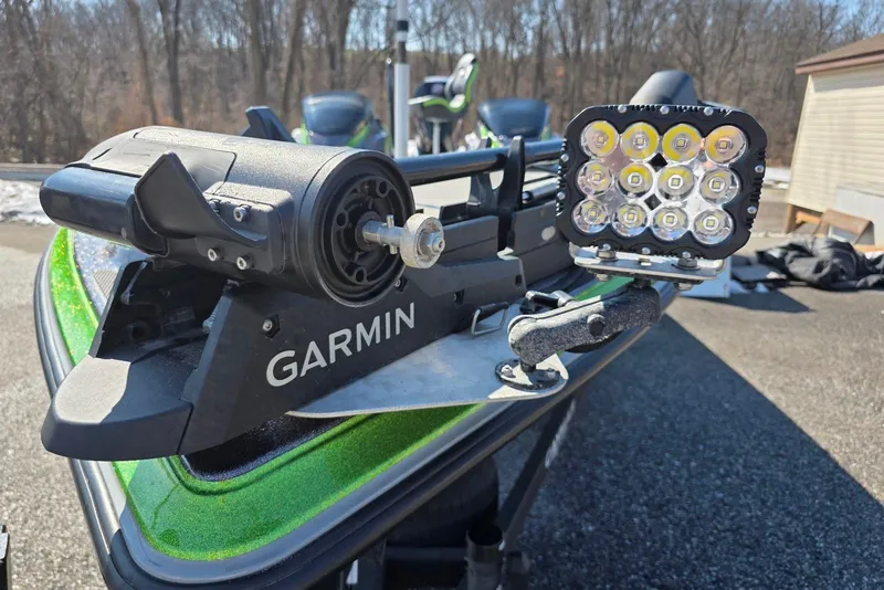 Slide: The Image of 2022 Caymas CX 21 boat with Garmin equipment and LED lights, parked outdoors. - 5