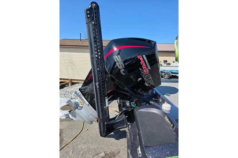 Slide: The Image of 2022 Caymas CX 21 boat with Mercury Pro XS 250 engine, outdoor setting. - 8