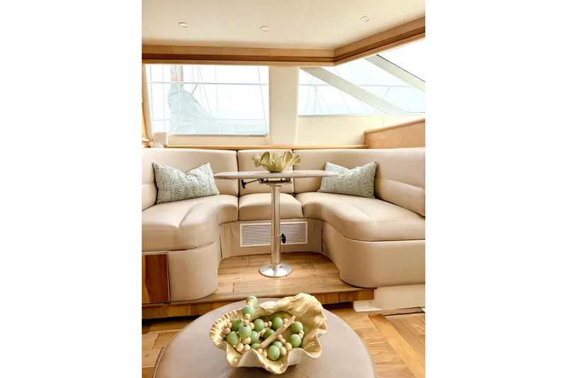 Slide: The Image of Luxurious interior of 1996 Carver 500 Cockpit Motor Yacht with elegant seating and decor. - 13