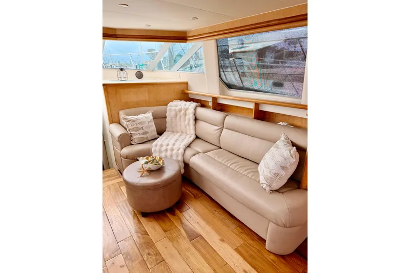 Slide: The Image of Luxurious interior of 1996 Carver 500 Cockpit Motor Yacht with plush seating and elegant decor. - 15