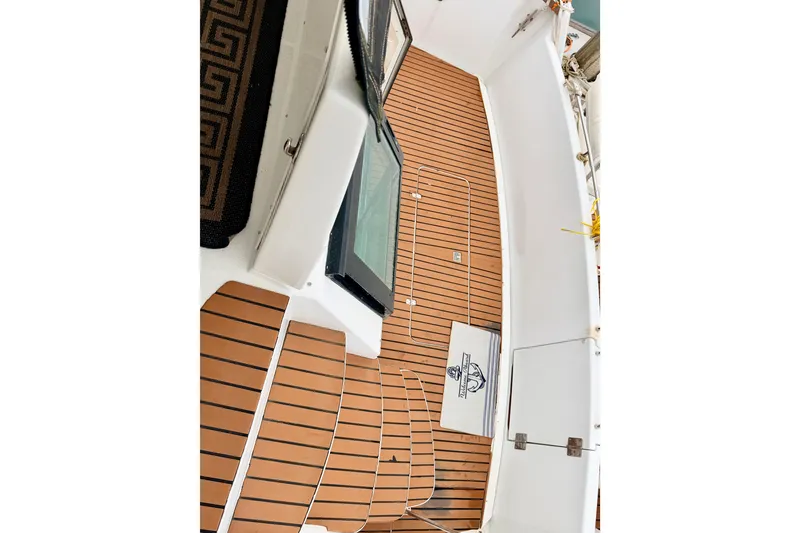 Slide: The Image of 1996 Carver 500 Cockpit Motor Yacht with teak deck and nautical decor. - 9