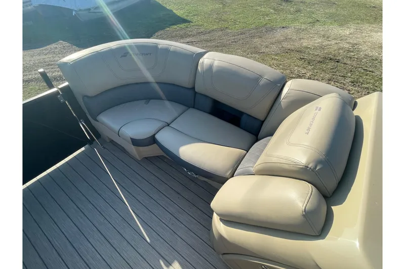 Slide: The Image of Luxurious seating on 2019 Starcraft SLS 3 boat, featuring beige leather upholstery. - 5