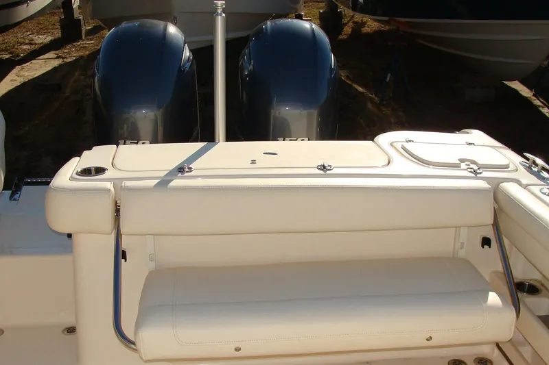 Slide: The Image of 2019 Grady-White Freedom 275 boat with dual engines and comfortable seating. - 19