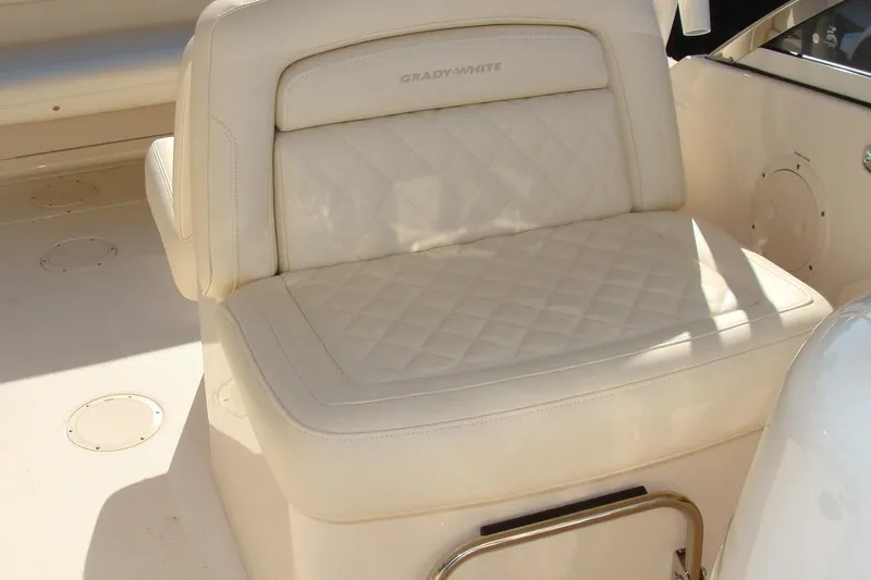 Slide: The Image of 2019 Grady-White Freedom 275 boat seat with quilted upholstery. - 7