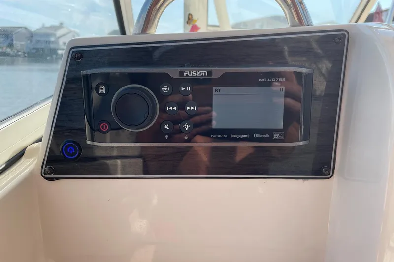 Slide: The Image of Fusion MS-UD755 stereo system on 2019 Grady-White Freedom 275 boat dashboard. - 8