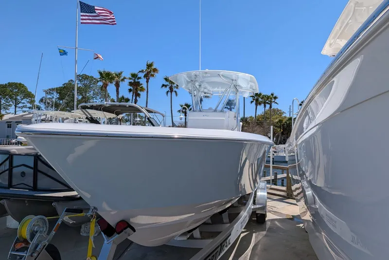 Slide: The Image of 2026 Contender 32 ST boat interior with seating and storage compartments. - 17