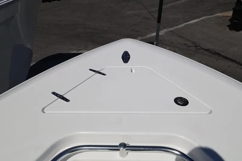 Slide: The Image of Bow of 2026 Contender 32 ST boat with storage hatch and cleat. - 25