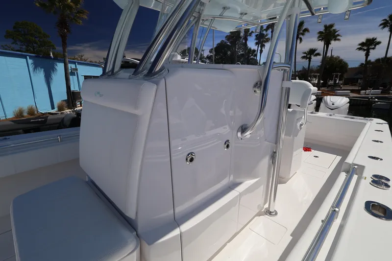 Slide: The Image of 2026 Contender 32 ST boat interior with sleek white seating and polished metal accents. - 31