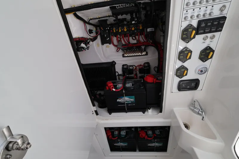 Slide: The Image of Electrical panel and battery setup in 2026 Contender 32 ST boat. - 37