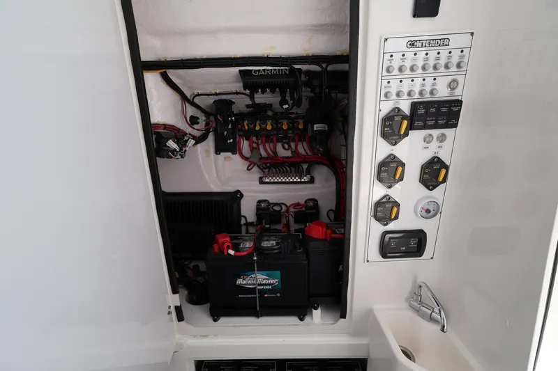 Slide: The Image of Electrical panel and battery compartment of 2026 Contender 32 ST boat. - 38