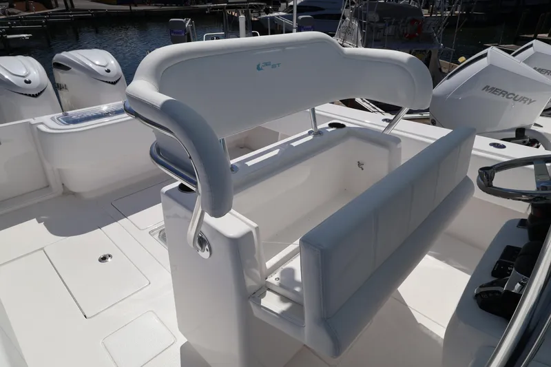 Slide: The Image of 2026 Contender 32 ST boat interior with seating and Mercury engines. - 46