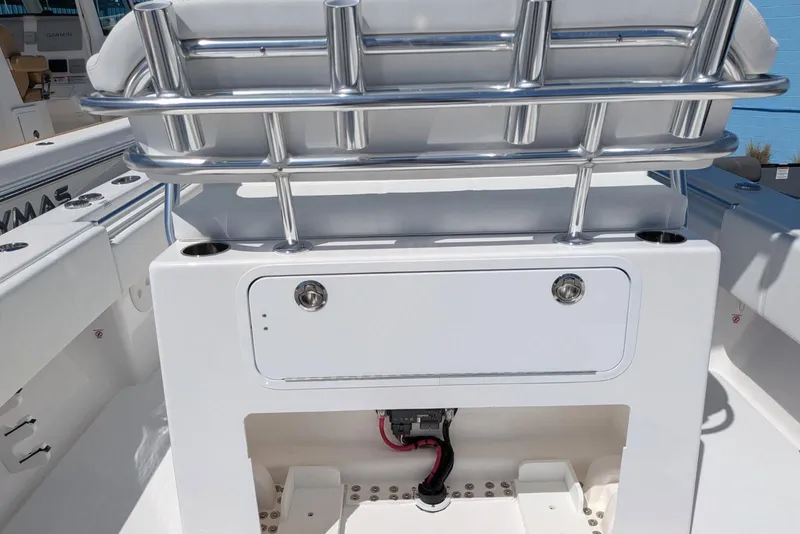 Slide: The Image of 2026 Contender 32 ST boat interior with stainless steel railings and storage compartment. - 47