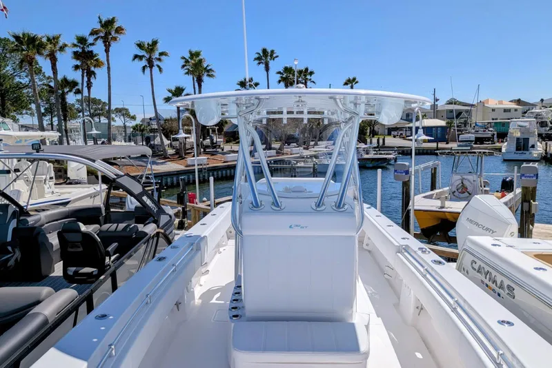 Slide: The Image of 2026 Contender 32 ST boat with advanced navigation system and sleek design. - 56