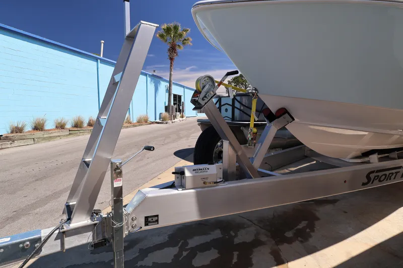 Slide: The Image of DeeMaxx disc brakes on Contender 32 ST, 2026 model, with blue wall background. - 58