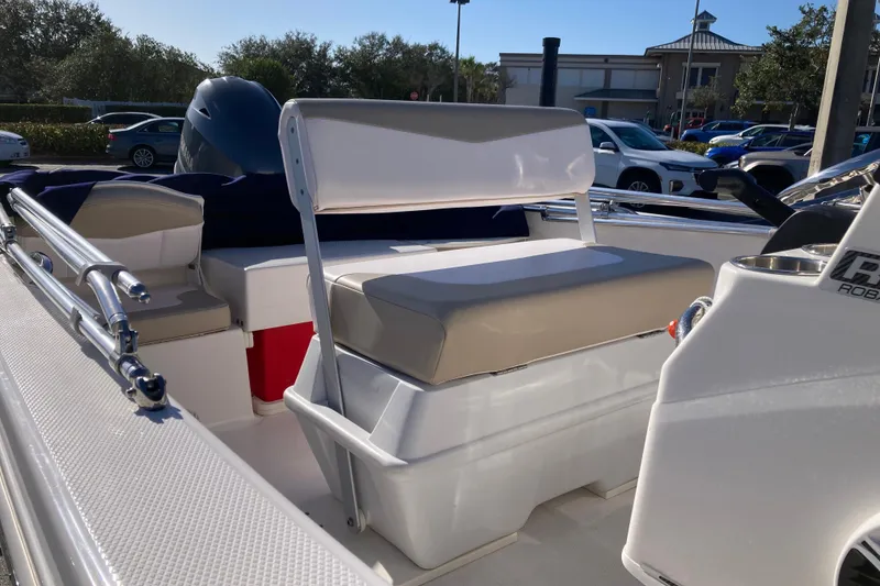 Slide: The Image of 2020 Robalo R160 Center Console boat interior with seating and console details. - 6