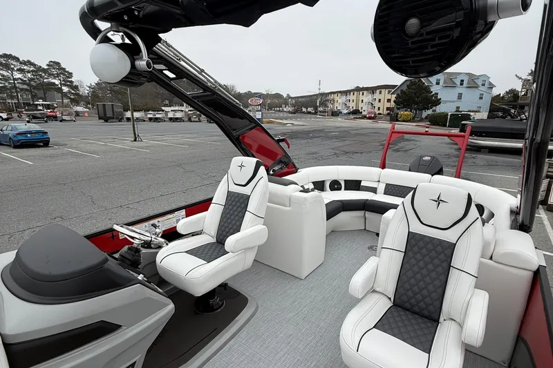 Slide: The Image of 2026 Berkshire 23RFX STS pontoon boat interior with luxurious seating and modern design. - 11