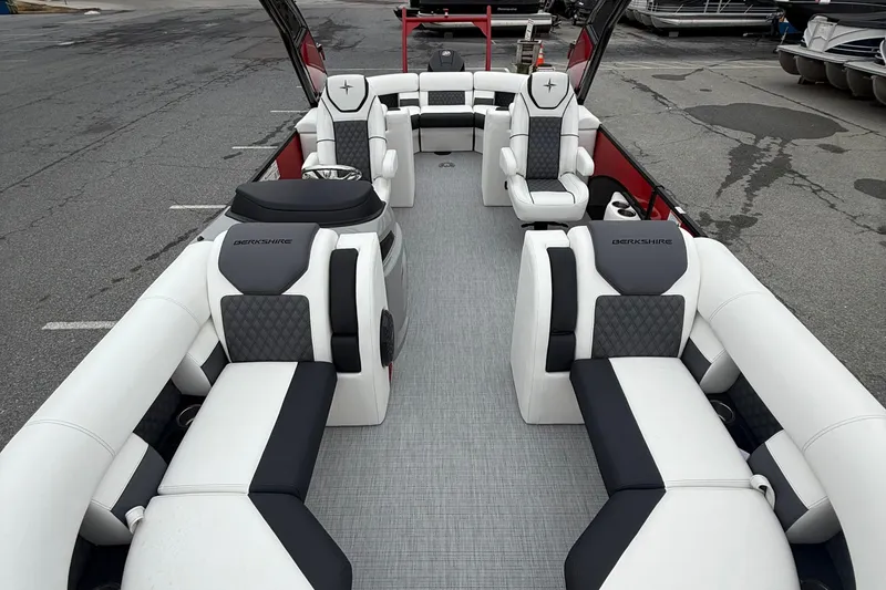 Slide: The Image of 2026 Berkshire 23RFX STS pontoon boat interior with luxurious seating and modern design. - 9