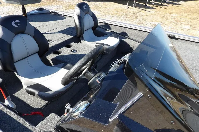 Slide: The Image of 2026 Crestliner XF 189 boat interior with dual seats and steering console. - 10