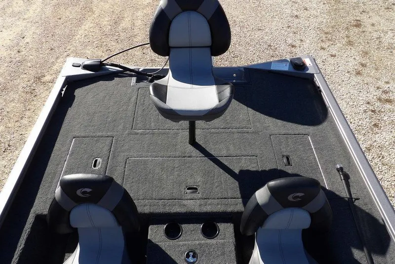 Slide: The Image of 2026 Crestliner XF 189 boat interior with three seats and carpeted deck. - 13