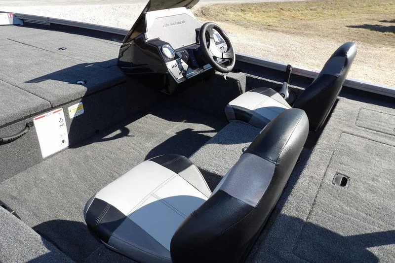 Slide: The Image of 2026 Crestliner XF 189 boat interior with dual seats and steering console. - 14