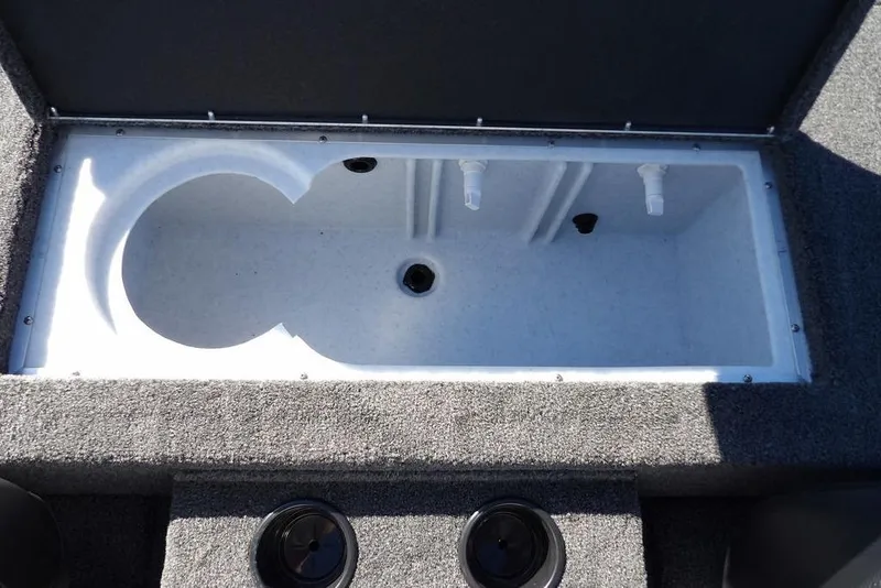 Slide: The Image of 2026 Crestliner XF 189 boat livewell with dual compartments and drainage system. - 17