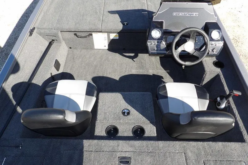 Slide: The Image of 2026 Crestliner XF 189 boat interior with dual seats and steering console. - 19