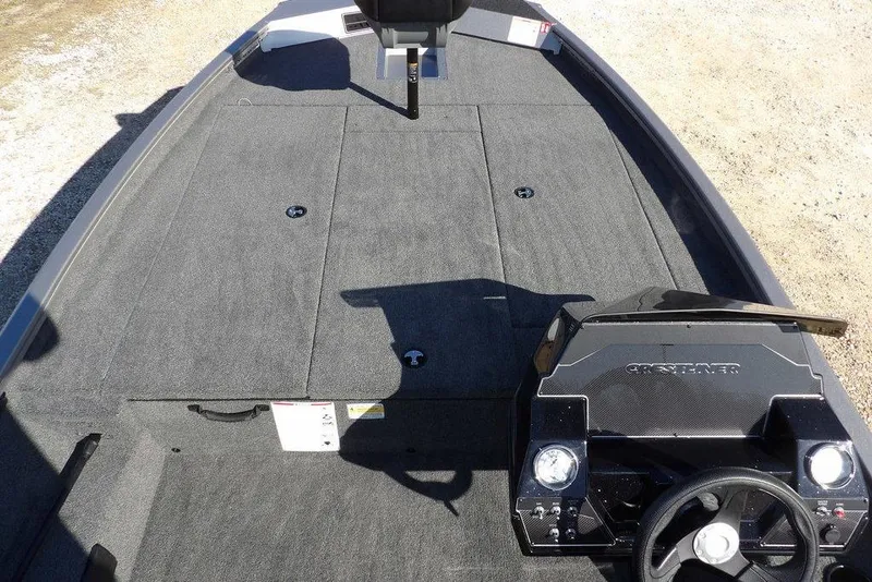 Slide: The Image of 2026 Crestliner XF 189 boat interior with spacious deck and steering console. - 26