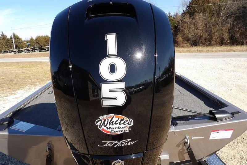 Slide: The Image of 2026 Crestliner XF 189 boat engine with "105" and "White's Marine Center" branding. - 28