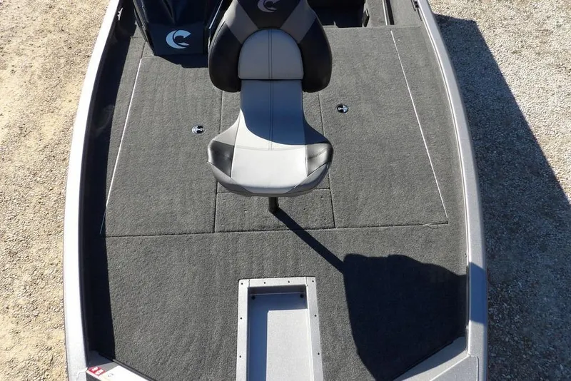 Slide: The Image of 2026 Crestliner XF 189 boat interior with gray carpet and swivel seat. - 31