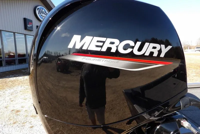 Slide: The Image of Mercury FourStroke engine on 2026 Crestliner XF 189 boat, outdoor dealership setting. - 33