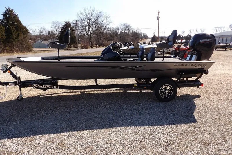 Slide: The Image of 2026 Crestliner XF 189 fishing boat on trailer, parked outdoors. - 8