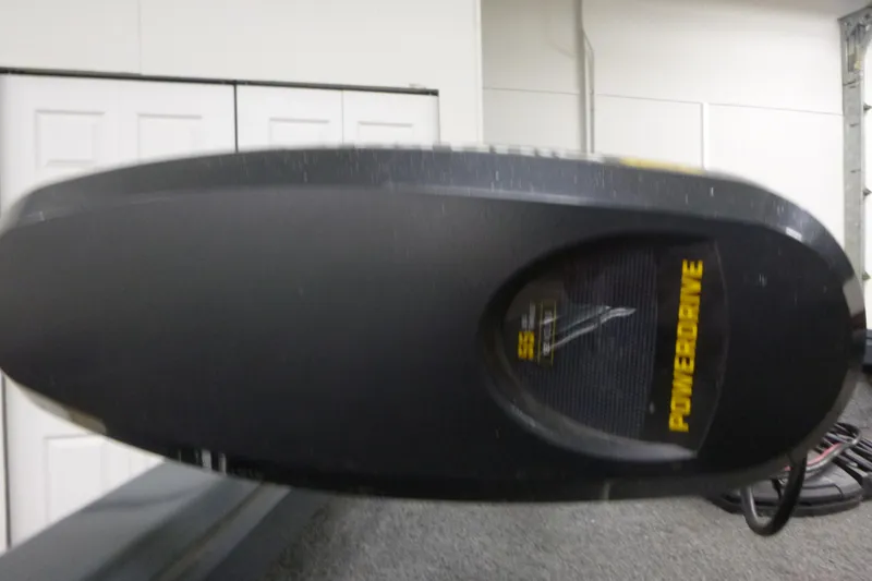 Slide: The Image of 2021 Ranger VS1660 T boat with PowerDrive motor in a garage setting. - 8