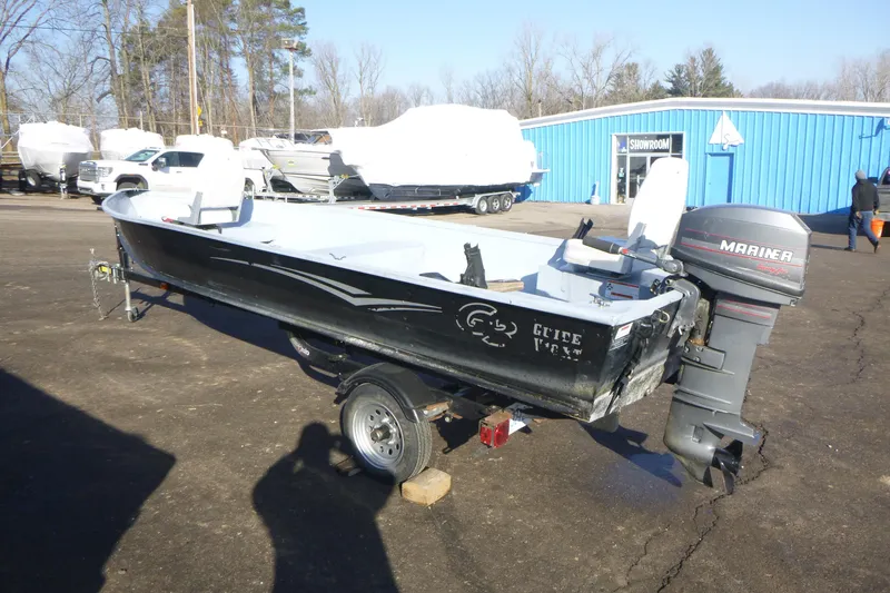 Slide: The Image of 2010 G3 Guide V16 XT boat with Mariner outboard motor on trailer. - 3