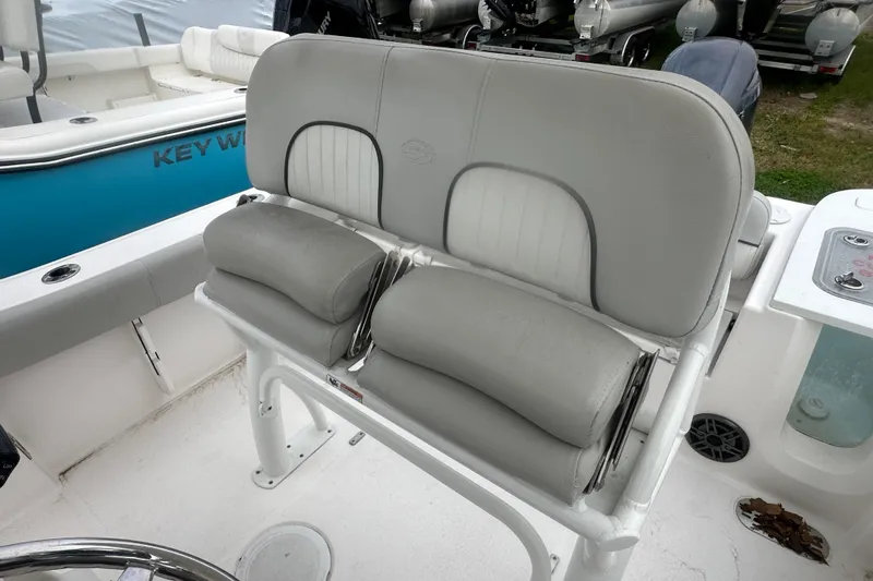 Slide: The Image of 2023 Sea Fox 228 Commander boat with comfortable gray seating and modern design. - 21