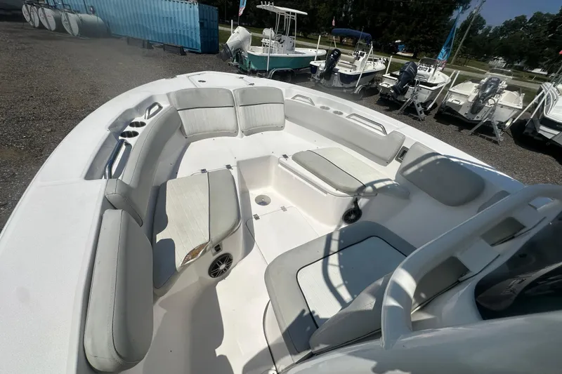 Slide: The Image of 2023 Sea Fox 228 Commander boat interior with cushioned seating and storage compartments. - 32