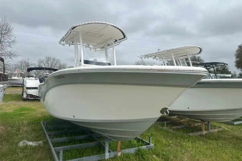 Slide: The Image of 2023 Sea Fox 228 Commander boat displayed outdoors on a trailer. - 4