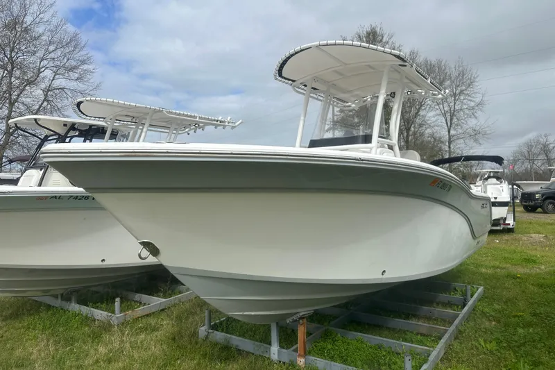 Slide: The Image of 2023 Sea Fox 228 Commander boat on trailer, displayed outdoors. - 5